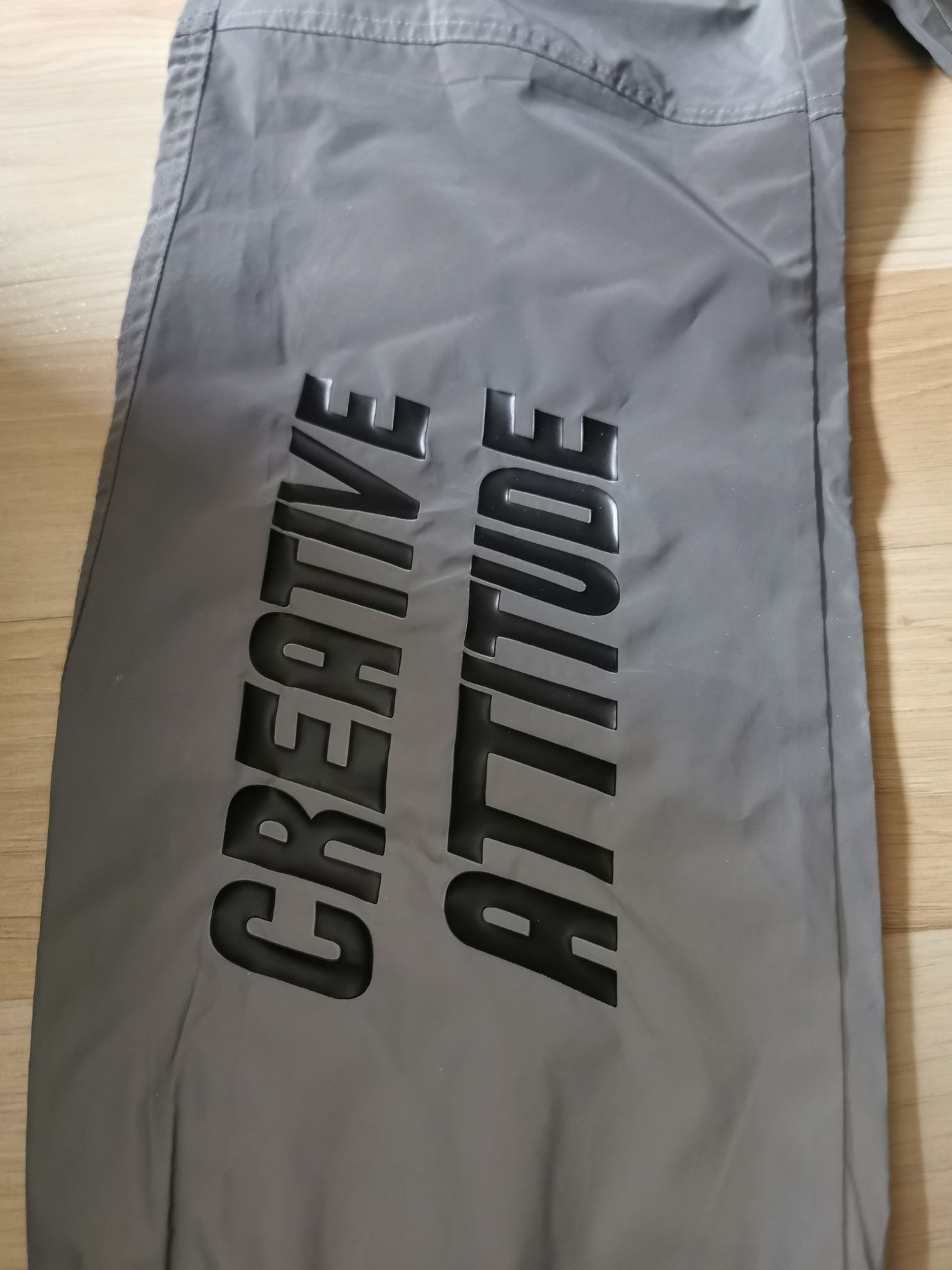 Odblaskowe nowe spodnie Bershka r. S