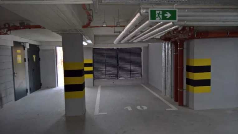 Miejsce parkingowe w garażu podziemnym Atal Dmowskiego 19 (G-K)