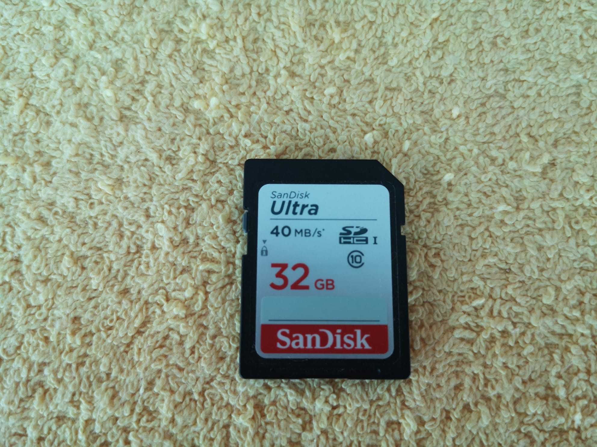 Disco, pen e cartão sandisk