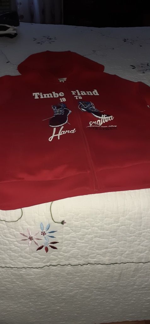 Excelente  casaco Timberland so' nao tem itiqueta mas da para prenda