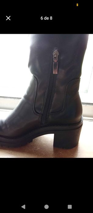 Botas pretas novas