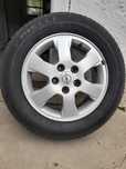 Продам колеса Pirelli 195/65R15 диски титанки