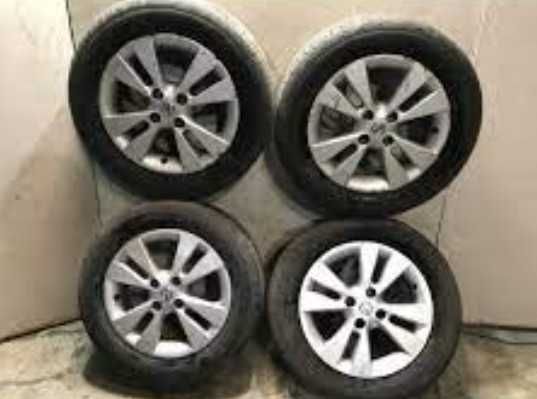 Оригінальні R15 диски на Nissan Note + шини Bridgestone 185/65 R15