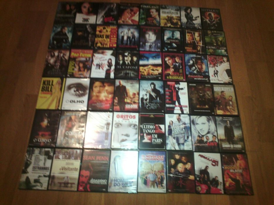 Coleção de 50 DVD novos na caixa Filmes recentes a 0.50 cêntimos cada