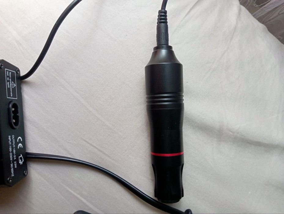 Продавця тату машинка