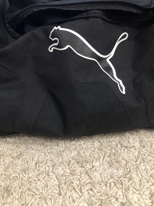 Фірмова дорожня сумка нова була лише один раз в користуванні