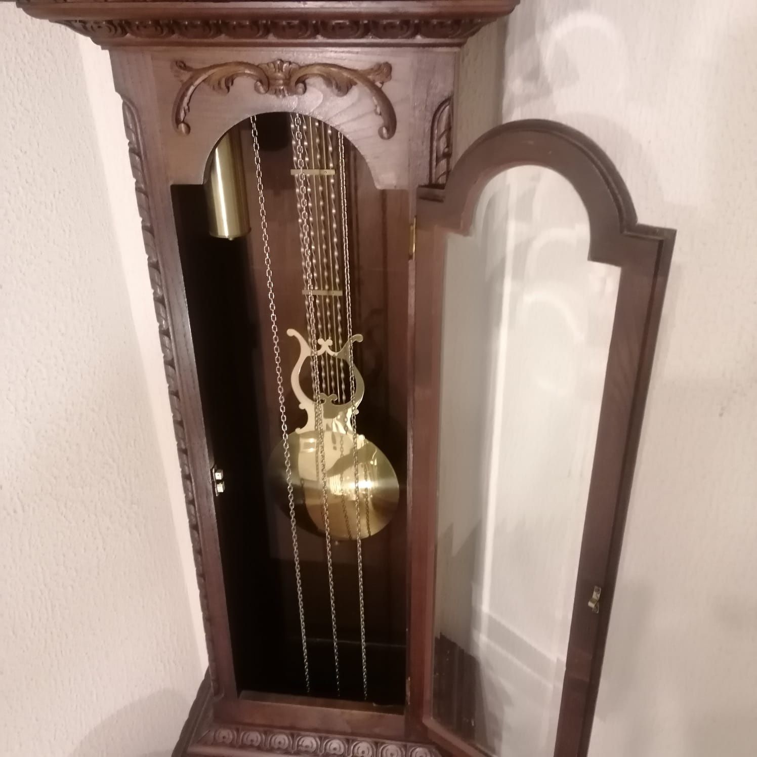 Relógio de pêndulo antigo