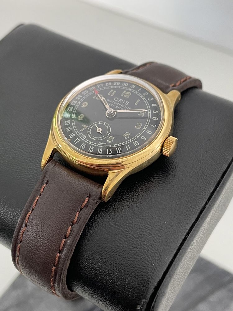 Relógio Vintage Oris Pointer Date Mostrador Preto e Caixa Dourada