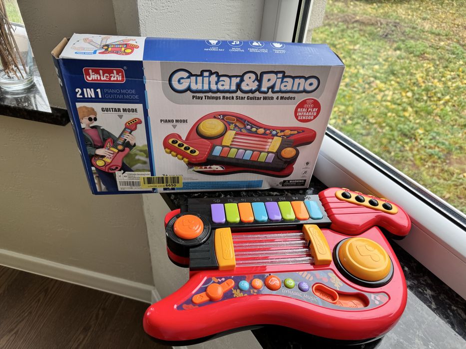 Дитяча гітара на батарейках