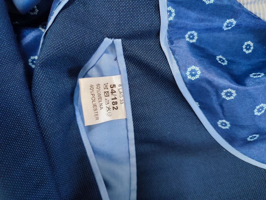 Garnitur młodzieżowy 60 % wełna granatowy męski XL/ L na 180 cm