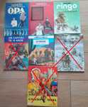 Diversos álbuns de capa dura.