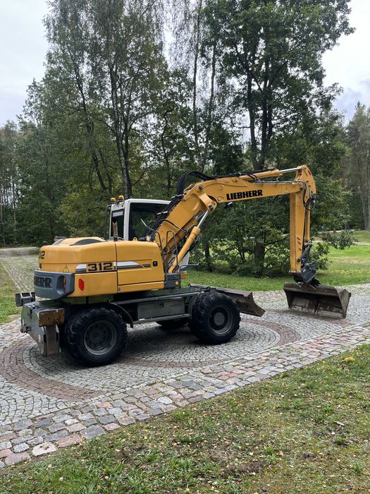 LIEBHERR A312 lift podpory koparka kołowa 314