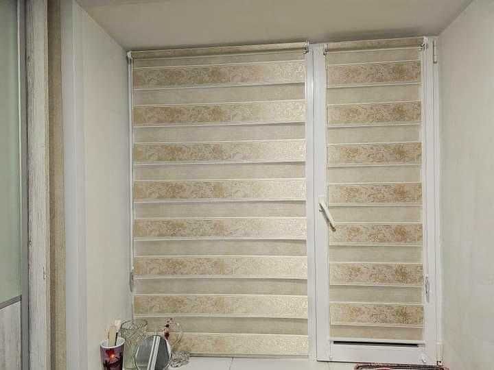 Рулонні жалюзі та тканинні штори «День-Ніч» у Харків від виробника