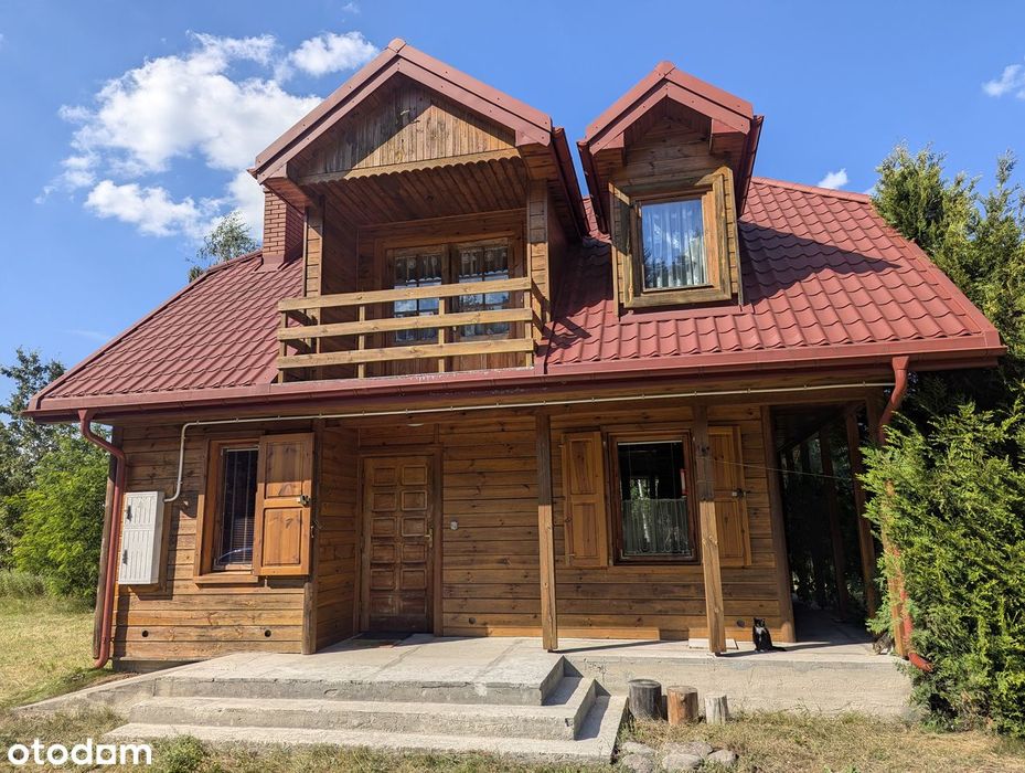 Dom drewniany na dużej działce w spokojnej okolicy
