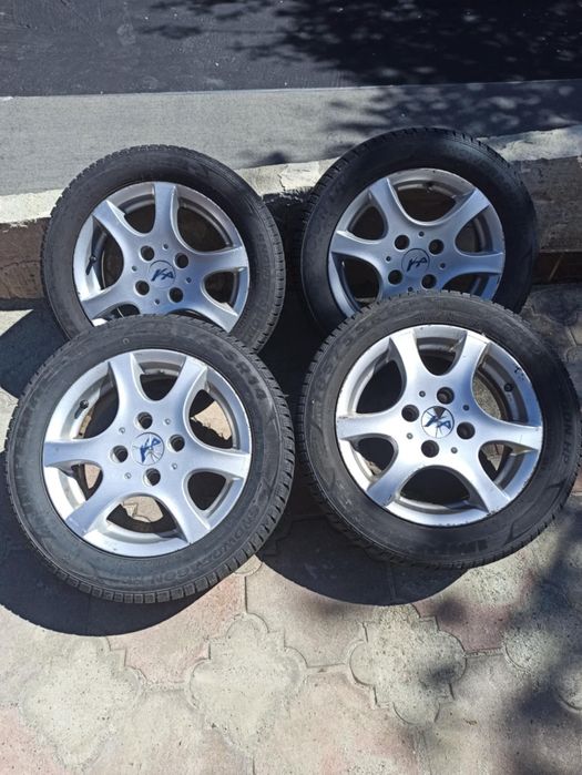 Felgi aluminiowe od Forda 14 cali z oponami