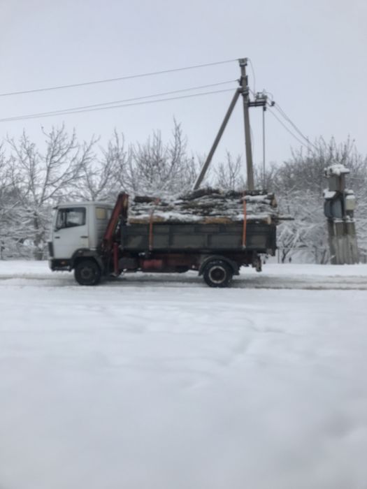 Мерседес самосвал маніпулятор доставки дрова