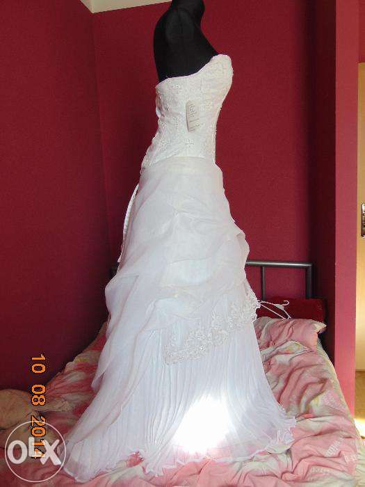 super nowiutka suknia ślubna