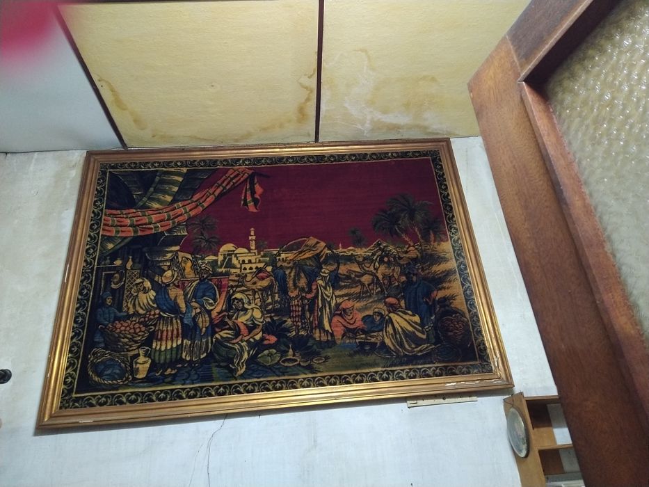 Tapeçaria encaixilhada.