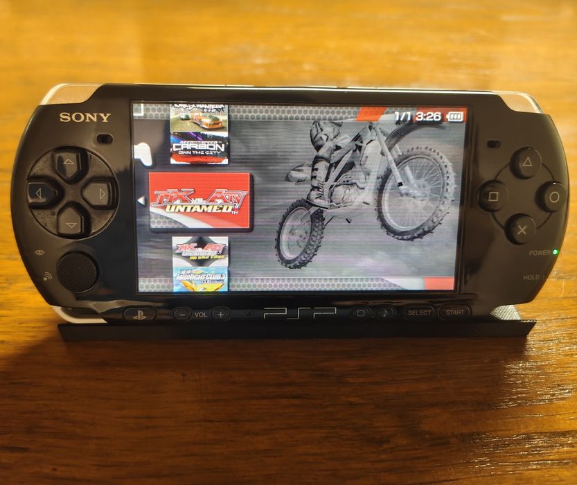 Sony PSP 3004 + Carregador + Bateria + Cartão 64GB + Suporte