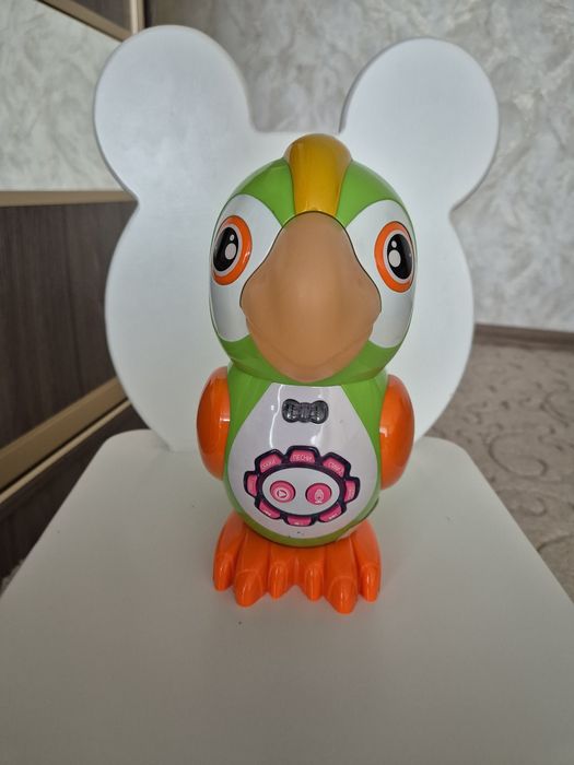 Попугай-сказочник музыкальная игрушка