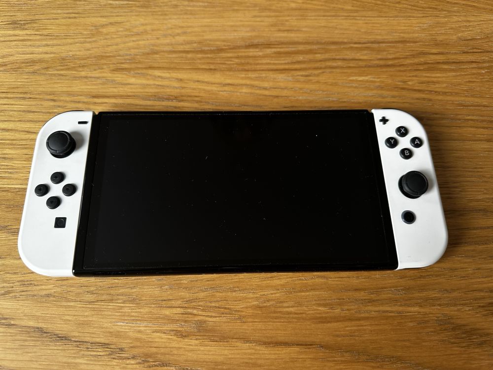 Nintendo Switch OLED Zestaw + pad + pokrowiec