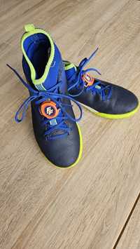Buty piłkarskie dla dzieci Kipsta Agility 500 Mid Mg Jr