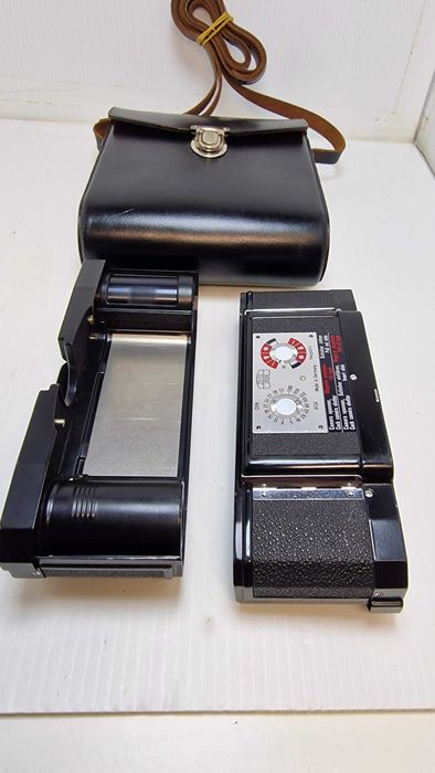 Contarex Zeiss . Estojo com 2 carregadores intermutáveis.