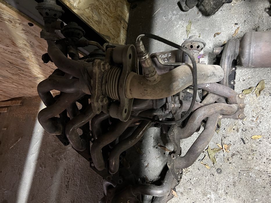 Колектор впускний випускний Volkswagen Bora Skoda Golf 4 Гольф 4 Fabia