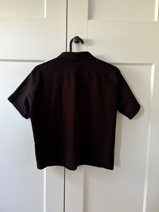 Czarna krótka bluzka polo z kołnierzykiem stradivarius