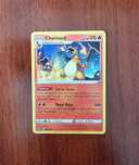 3 Cartas Pokémon - Charizard, Eevee e Umbreon