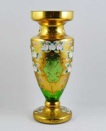 Jarra antiga com decoração floral e pássaros