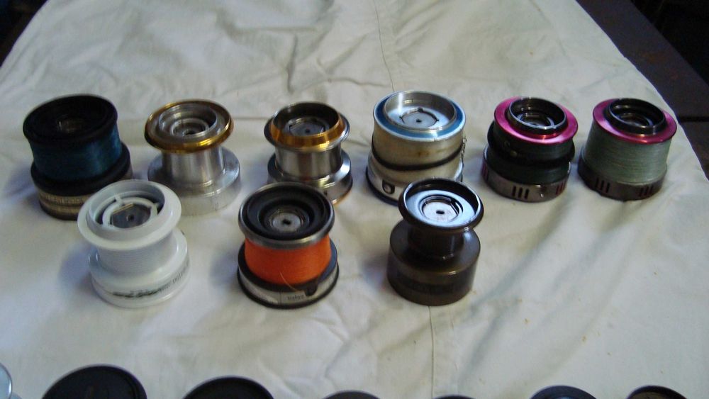 Material   para  pesca,  carretes  usados