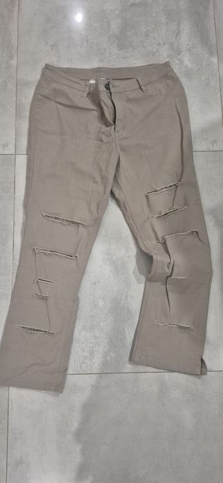 Spodnie z dziurami 7/8