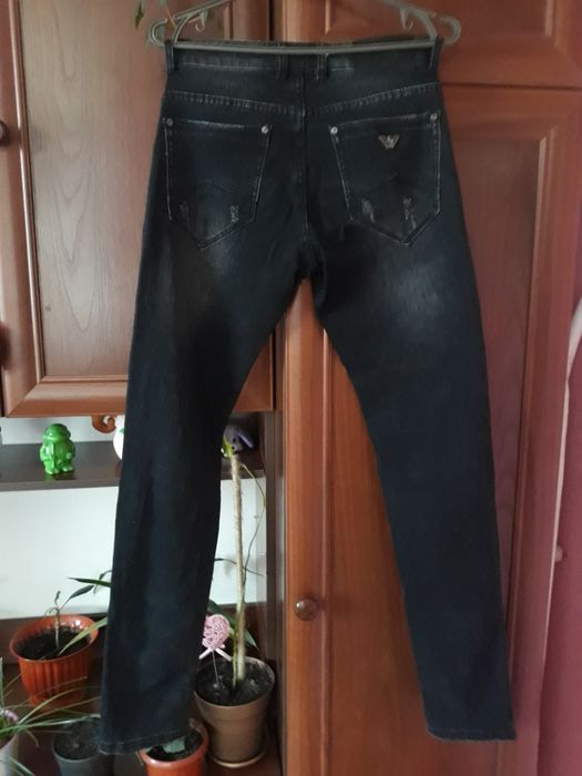 Нові джинси чорного кольору