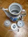 Elektryczny porcelanowy czajnik, do zaparzania kawy, herbaty.