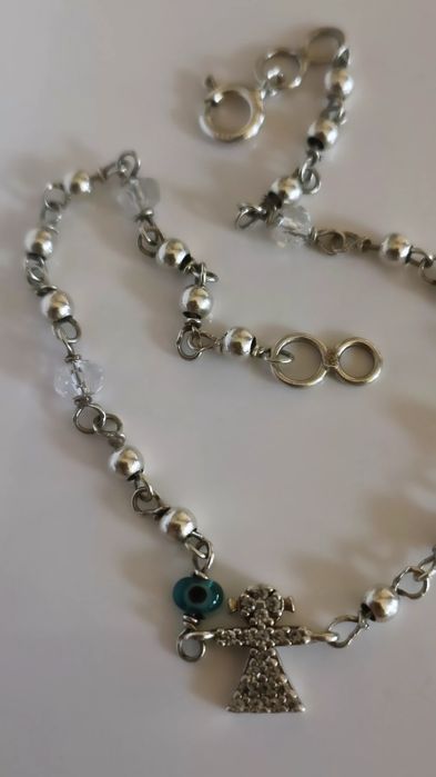 Pulseira em prata menina e olho gordo