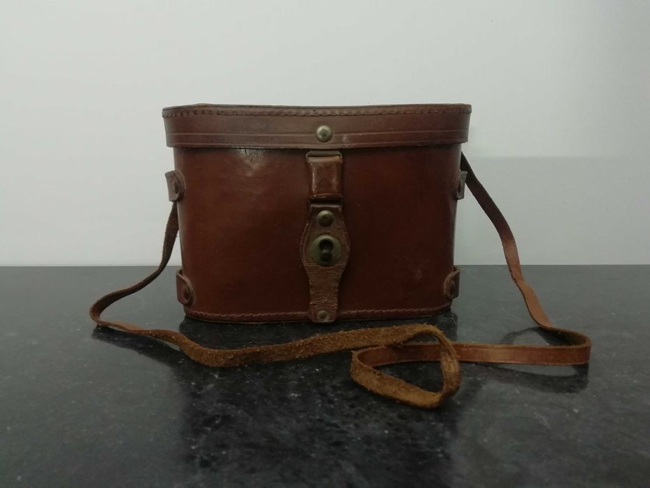 Binóculos antigos com estojo em pele