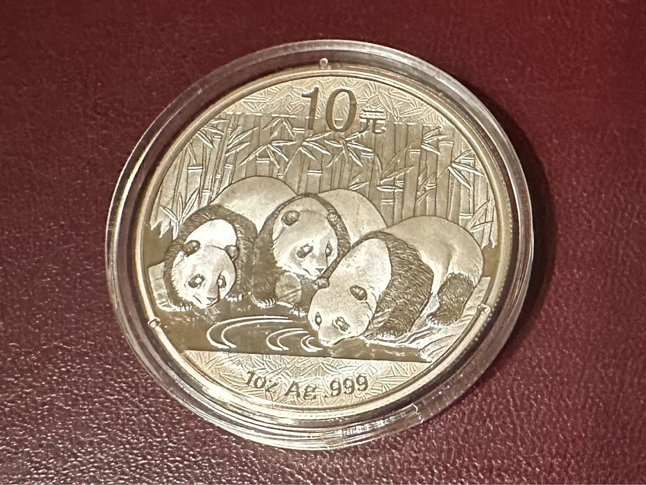 Инвестиционная монета Китая панда 10 юаней 2013 и 2015 год.