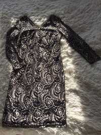 Wieczorowa sukienka OUiOSOUE , z czarno- zlotej koronki.