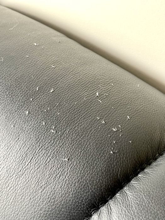 Black faux leather sofa