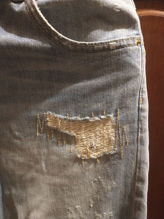 Jeansy z rozdarciami rozm.L