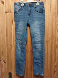 Spodnie jeans 158