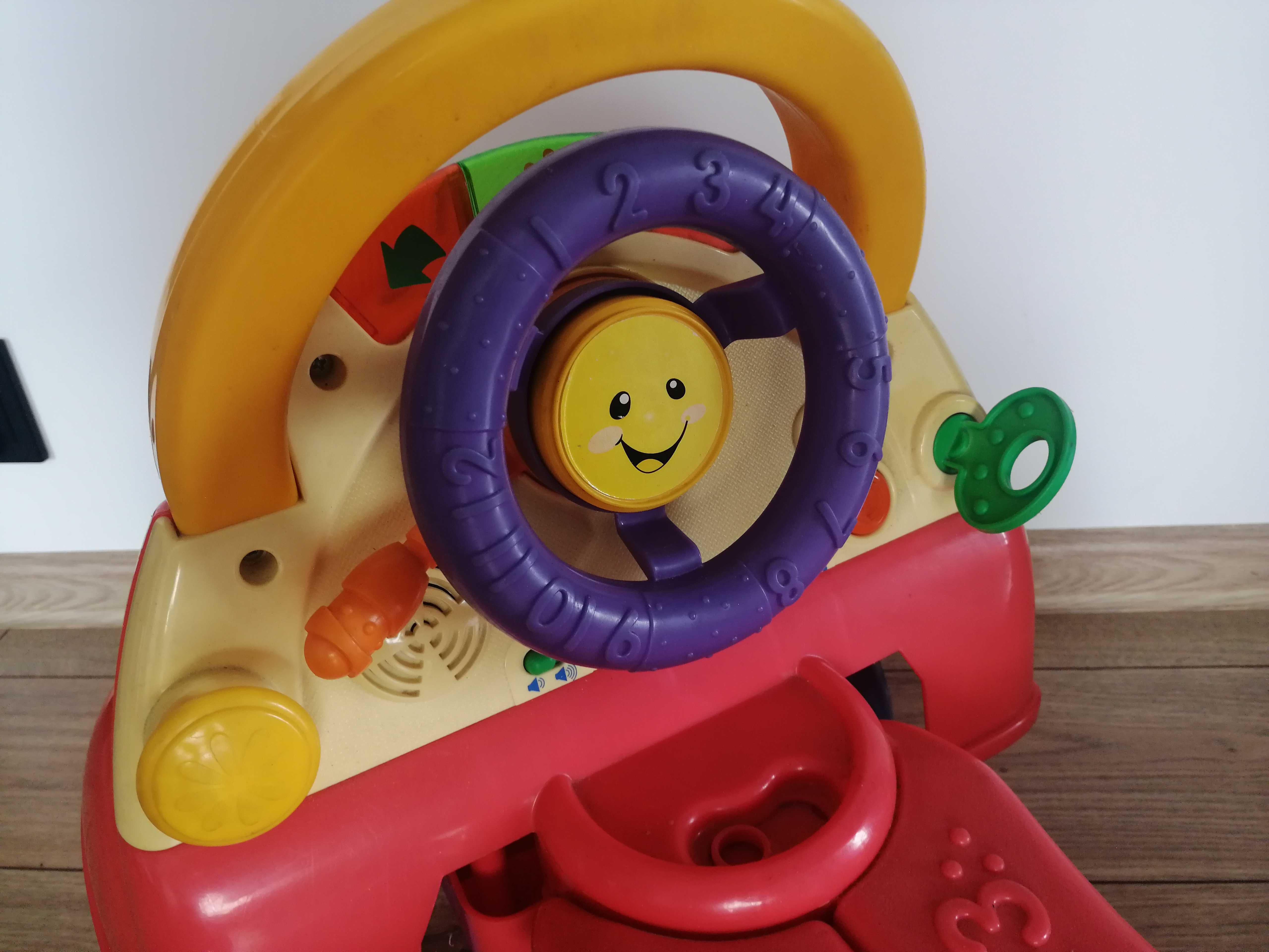 Jeździk pchacz Fisher price