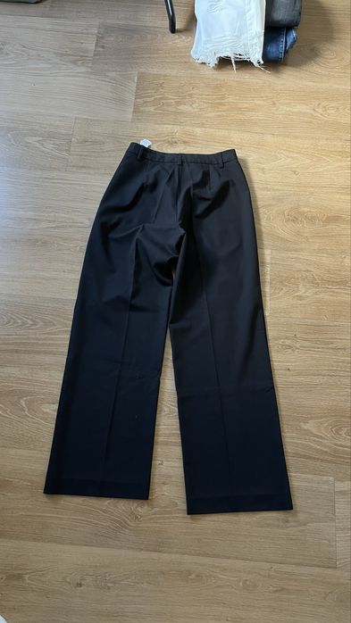 Calças de tecido pretas