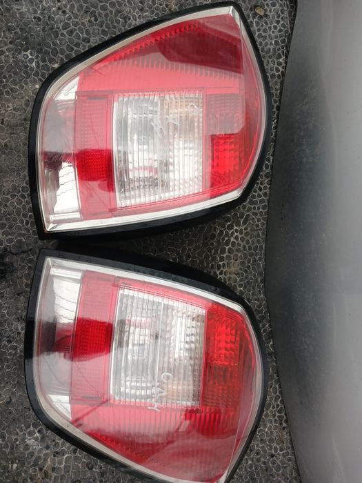 Задні ліхтарі стопи Opel adtra h унівепсал