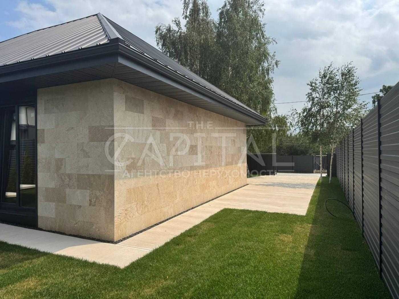 БЕЗ %Сучасний  будинок 160 м2 з фасадом із натурального травертину