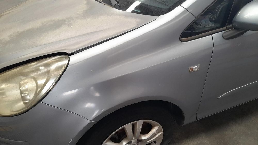 Guarda-lamas esquerdo OPEL Corsa D