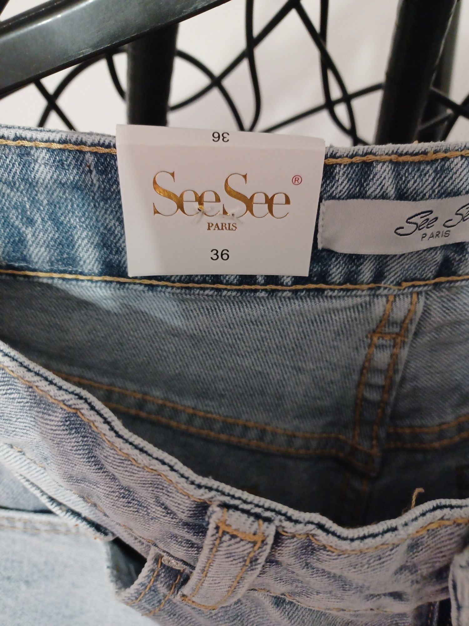 Nowe jeansy damskie z rozdarciami rozmiar 36