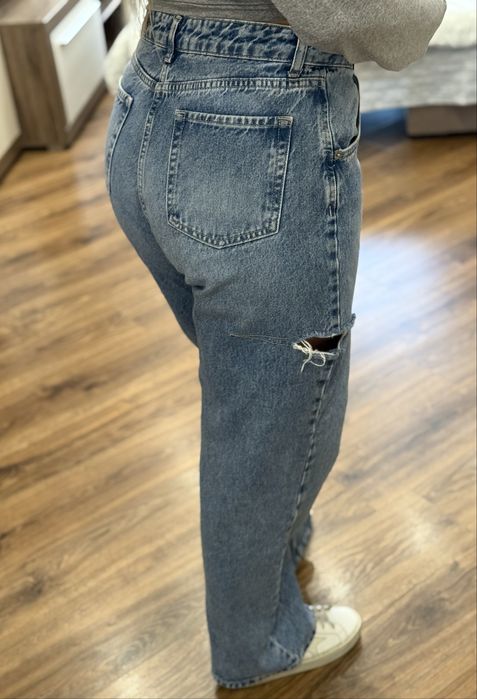 Джинсы с разрезами по бокам