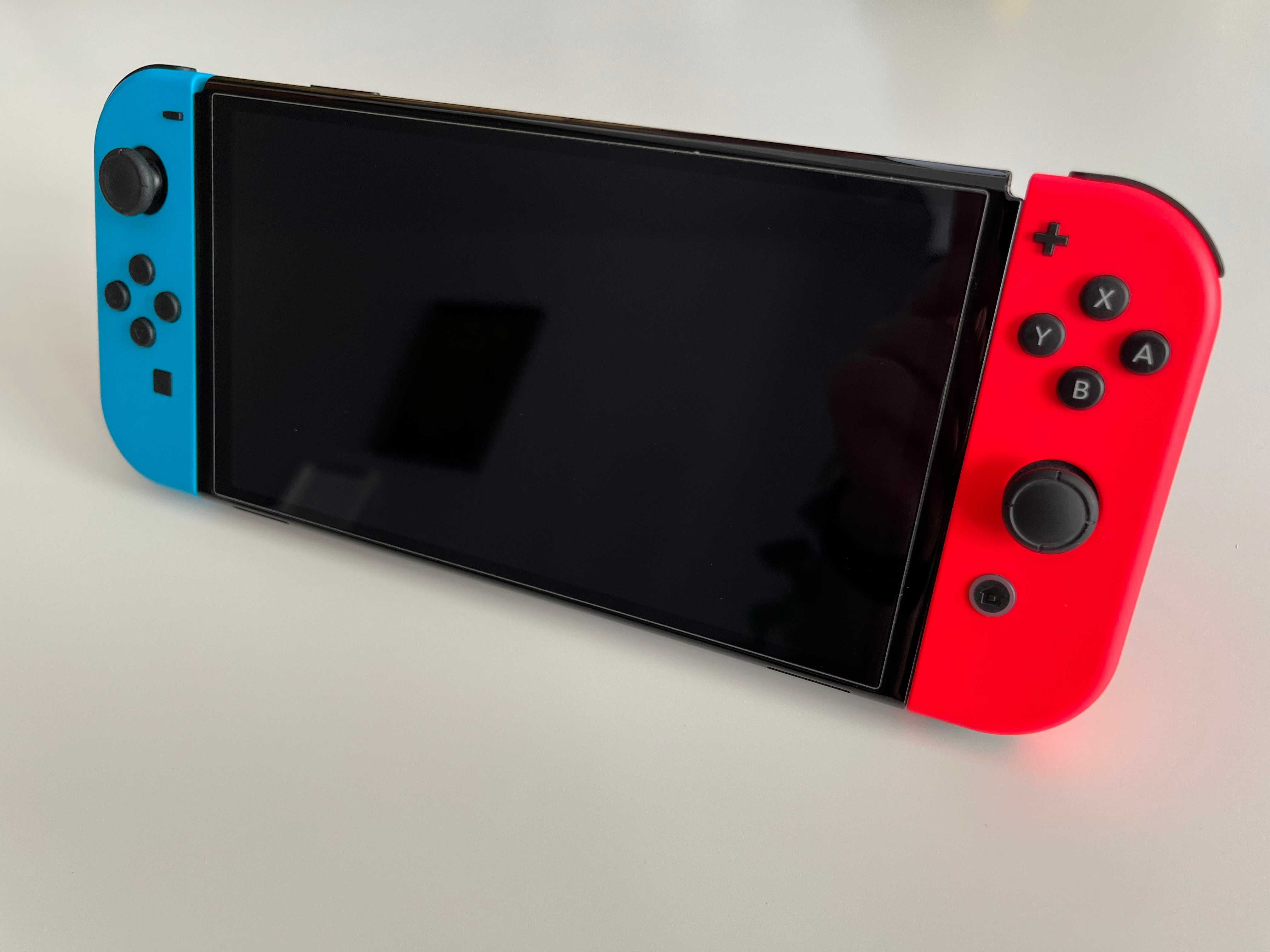 Nintendo Switch Oled + The Legend of Zelda: BOTW